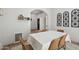 Dining room with a white table cloth and tan chairs at 4137 W Cielo Grande --, Glendale, AZ 85310