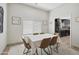 Dining room with a white table cloth and tan chairs at 4137 W Cielo Grande --, Glendale, AZ 85310