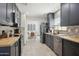 Open kitchen features stainless appliances, butcher block counters and adjacent breakfast nook and dining area at 4137 W Cielo Grande --, Glendale, AZ 85310