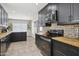 Updated kitchen with butcher block counters, stainless steel appliances and views to the breakfast nook at 4137 W Cielo Grande --, Glendale, AZ 85310