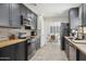 Contemporary kitchen with stainless appliances, butcher block counters and a view of the breakfast nook at 4137 W Cielo Grande --, Glendale, AZ 85310
