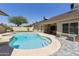 Beautiful pool area with built-in steps, a spa, and a paved patio, perfect for summer relaxation at 4137 W Cielo Grande --, Glendale, AZ 85310