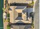 Aerial view showcases roof of home with courtyard, driveway, waterfront and neighboring properties at 41584 W Springtime Rd, Maricopa, AZ 85138