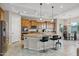 Bright, spacious kitchen with granite countertops and modern stainless steel appliances at 41584 W Springtime Rd, Maricopa, AZ 85138