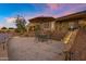 Enjoy outdoor living with this patio and waterfront views, perfect for relaxation and entertaining at 41584 W Springtime Rd, Maricopa, AZ 85138