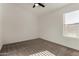A well-lit bedroom with carpet and ceiling fan provides a comfortable, move-in ready space at 42067 W Anne Ln, Maricopa, AZ 85138