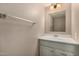 Traditional bathroom featuring a vanity with drawers, mirror, and neutral tones at 4601 N 102Nd Ave # 1116, Phoenix, AZ 85037