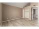Bright bedroom features vaulted ceilings, wood-look floors and walk-in closet at 4601 N 102Nd Ave # 1116, Phoenix, AZ 85037