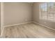 Bright bedroom features vaulted ceilings, wood-look floors and neutral paint at 4601 N 102Nd Ave # 1116, Phoenix, AZ 85037