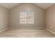 Bright bedroom features vaulted ceilings, wood-look floors and neutral paint at 4601 N 102Nd Ave # 1116, Phoenix, AZ 85037