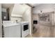 Laundry room near living area features washer and dryer units at 4601 N 102Nd Ave # 1116, Phoenix, AZ 85037