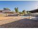 Expansive backyard featuring a private in-ground pool, gravel landscaping and plenty of space for outdoor activities at 4855 E Gary St, Mesa, AZ 85205