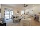Open-concept living space with light wood floors, neutral decor, and plenty of natural light at 4855 E Gary St, Mesa, AZ 85205
