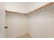 Bright, empty walk-in closet with a single shelf and rod, ready for organizing your wardrobe at 4855 E Gary St, Mesa, AZ 85205