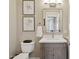 Charming half bathroom featuring a granite vanity, modern fixtures, and tasteful decor at 4960 E Dale Ln, Cave Creek, AZ 85331