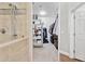 Spacious walk-in closet with built-in shelving and storage solutions for clothing, shoes, and accessories at 4960 E Dale Ln, Cave Creek, AZ 85331