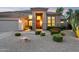 Beautiful home featuring desert landscaping, a tile roof, and an inviting front entryway at 4960 E Dale Ln, Cave Creek, AZ 85331