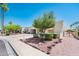 Attractive desert landscaping enhances this property, showcasing its beautiful curb appeal and outdoor charm at 5209 N 78Th St, Scottsdale, AZ 85250