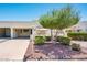 Charming single-story home featuring desert landscaping and a well-manicured yard, enhancing its curb appeal at 5209 N 78Th St, Scottsdale, AZ 85250