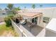 Charming patio with a grill, lounge chair, and a quaint seating area, ideal for outdoor gatherings and relaxation at 5209 N 78Th St, Scottsdale, AZ 85250