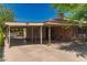 Exterior shot of the home's covered carport offering convenient parking, with easy access to the house at 6100 N 36Th Ave, Phoenix, AZ 85019