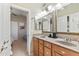 Bathroom featuring double sinks, decorative mirrors, and great lighting at 67 W Sarah Ln, Tempe, AZ 85284