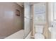 Bathroom featuring a shower and a toilet behind a glass door at 67 W Sarah Ln, Tempe, AZ 85284