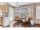 Cozy dining nook with natural light and comfortable seating near the kitchen at 67 W Sarah Ln, Tempe, AZ 85284