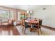 Elegant dining room with a formal dining set and large windows at 67 W Sarah Ln, Tempe, AZ 85284