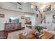 Spacious living room with hardwood floors, high ceilings, and staircase at 67 W Sarah Ln, Tempe, AZ 85284