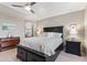Spacious main bedroom featuring dark furniture, neutral walls, and bright natural light at 67 W Sarah Ln, Tempe, AZ 85284