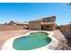 The backyard features a private pool and patio at 6944 S Morning Dew Ln, Buckeye, AZ 85326
