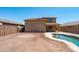 Backyard features pool and patio space, great for entertaining at 6944 S Morning Dew Ln, Buckeye, AZ 85326