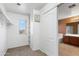 Walk-in closet with shelving and hanging racks, providing ample storage space at 6944 S Morning Dew Ln, Buckeye, AZ 85326