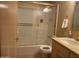Bathroom featuring a tub and shower combination, a vanity, and tile flooring at 7637 E Thornwood Dr, Scottsdale, AZ 85251