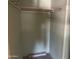 Walk-in closet featuring a hanging rod and shelf for easy storage at 7637 E Thornwood Dr, Scottsdale, AZ 85251