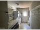 Laundry room with a washer and dryer and ample storage space at 7637 E Thornwood Dr, Scottsdale, AZ 85251
