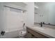 Bathroom featuring a single vanity, a toilet, and a shower-tub combo with a black showerhead at 7956 W Griswold Rd, Peoria, AZ 85345