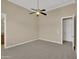 Spacious bedroom with ceiling fan, and carpet floors at 8031 W Morten Ave, Glendale, AZ 85303