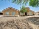 Charming single-story home with a tile roof and drought-tolerant landscaping in a suburban setting at 8031 W Morten Ave, Glendale, AZ 85303