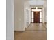 Inviting foyer boasts a decorative tiled floor, a chandelier, and a view of the home's interior at 8031 W Morten Ave, Glendale, AZ 85303