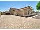 Spacious three-car garage with a paved driveway, offering ample parking and storage at 8031 W Morten Ave, Glendale, AZ 85303