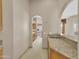 Spacious kitchen with granite countertops and stainless steel appliances at 8031 W Morten Ave, Glendale, AZ 85303