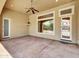 Covered patio with stamped concrete flooring and views of the backyard pool at 8031 W Morten Ave, Glendale, AZ 85303