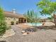Inviting backyard oasis with a sparkling pool and spa, perfect for relaxation and outdoor entertaining at 8031 W Morten Ave, Glendale, AZ 85303