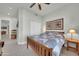 Spacious bedroom with wood furniture and tile floors at 8180 E Shea Blvd # 1019, Scottsdale, AZ 85260