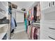 Walk-in closet featuring custom shelves and ample storage space for clothes and accessories at 8180 E Shea Blvd # 1019, Scottsdale, AZ 85260