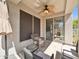 Covered patio with outdoor seating, ceiling fan, and backyard view, enhancing outdoor living at 8180 E Shea Blvd # 1019, Scottsdale, AZ 85260
