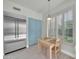 Kitchen eat-in area featuring a stainless steel fridge, natural light, and dining table at 8180 E Shea Blvd # 1019, Scottsdale, AZ 85260