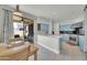 Bright eat-in kitchen with blue cabinets, stainless steel appliances, and sliding door to patio at 8180 E Shea Blvd # 1019, Scottsdale, AZ 85260